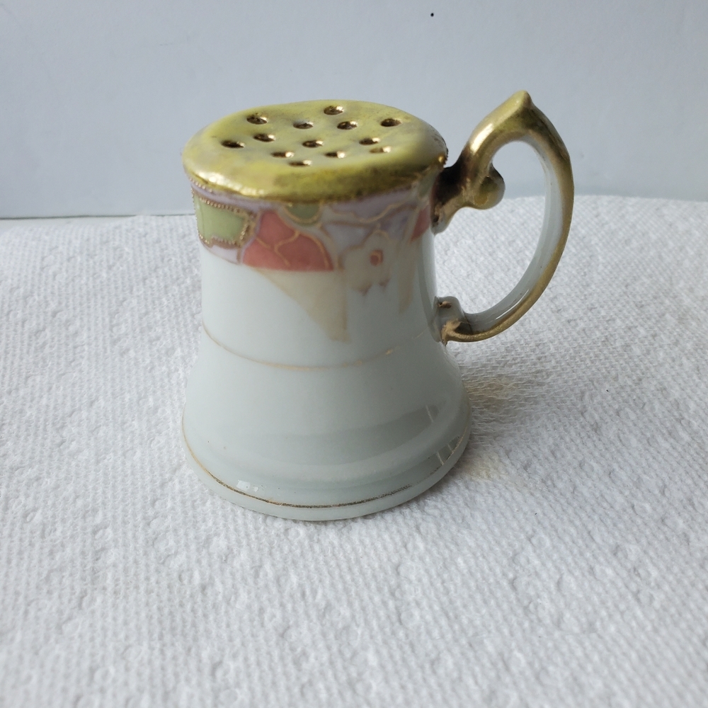 VINTAGE HAND PAINTED ONLY HAD ONE  SALT OR PEPPER SHAKER.